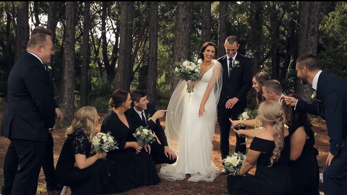 Teagan enjoying a romantic moment with her husband by Jamberoo Resort Riverbed