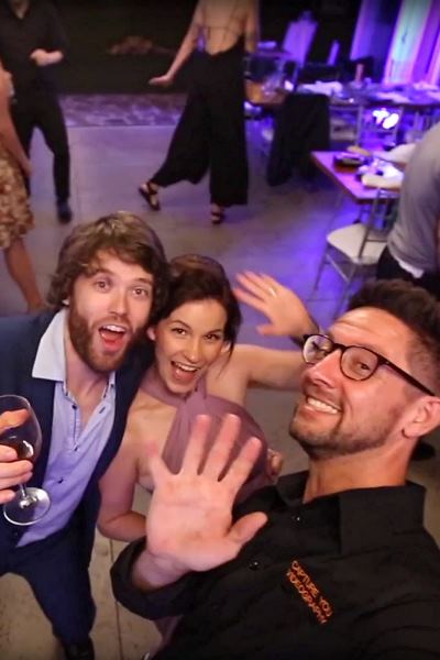Shane from Capture You Videography enjoying a selfie picture with wedding guests